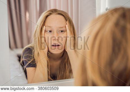 Extremly Tired Young Woman Looking At Himself In The Mirror, Home Alone. Self-isolation At Home, Qua