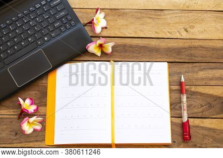 Notbook Monthly Planner With Computer For Business Work Of Lifestyle At Office Arrangement Flat Lay 
