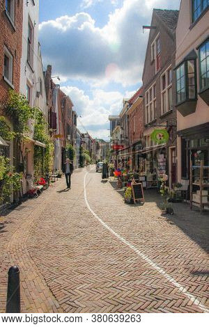 Deventer, Netherlands - July 11 2020: View Of The Famous Walstraat In The Dutch Historic City Center