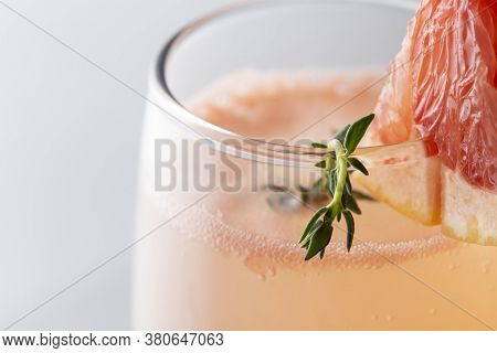 Close Up Of Mimosa Cocktail In A Champagne Flute With Grapefruit Juice And Sparkling Wine Decorated 