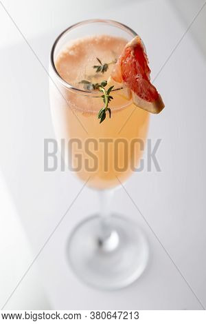 High Angle View Of Mimosa Cocktail In A Champagne Flute With Grapefruit Juice And Sparkling Wine Dec