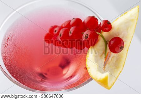 Close Up Of Cosmopolitan Cocktail With Vodka, Triple Sec, Cranberry Juice And Freshly Squeezed Lime 