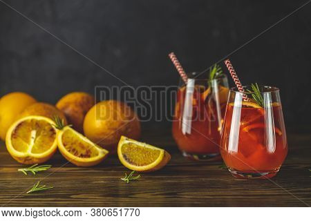 Two Glasses Of Campari Gin Spritz. Cocktail Of Sweet, A Touch Of Bitter From The Campari And Gorgeou