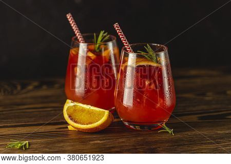 Two Glasses Of Campari Gin Spritz. Cocktail Of Sweet, A Touch Of Bitter From The Campari And Gorgeou