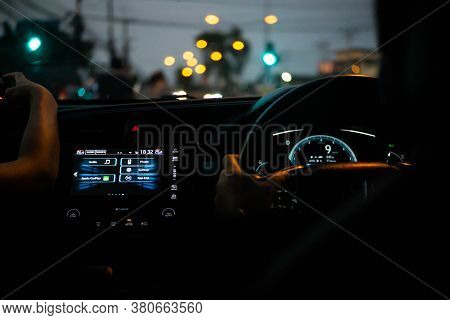 Chantaburi, Thailand - 10 August 2020 : Driving At Night Car Interior Photos. The Car Dashboard And 