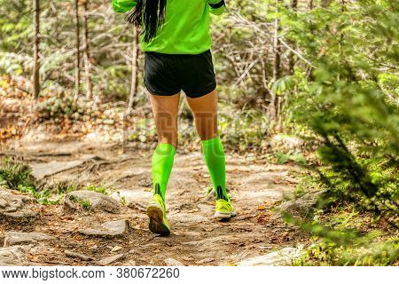 Girl Runner In Compression Socks Run Forest Trail Race