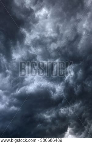Vertical Hi Contrast Texture Of Dense Cumulo Clouds