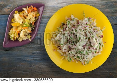 Salad Daikon, Onions And Dill On Blue Grey Wooden Background. Salad On Yellow Plate With Vegetarian 