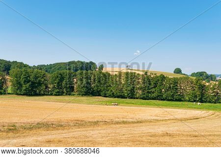Extensive Hilly Landscape With Fields, Meadows And Forests In Rhoen Mountains Region Of Germany On C