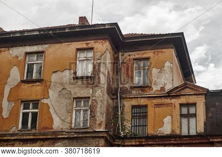 Old Vintage Dacayed Neglected Building Facade Closeup In Cloudy Day