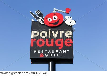 Belleville, France - March 20, 2018: Poivre Rouge Restaurant Logo On A Pole. Poivre Rouge Is A Chain