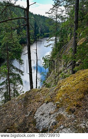 Overlooking A Little Lake From A Mountain In Sweden