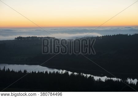Majestic Landscape Image Of Cloud Inversion At Sunset Over Dartmoor National Park In Engand With Clo