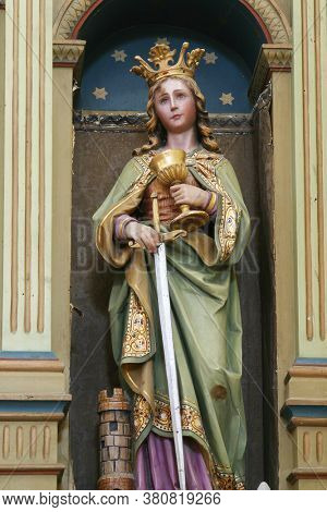 ROZGA, CROATIA - SEPTEMBER 15, 2012: St. Barbara, Altar Sacred Heart of Jesus at St. Anne Church in Rozga, Croatia