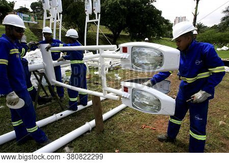Salvador, Bahia / Barazil - May 18, 2014: Workers Work On The Installation Of Streetlights In The Ci