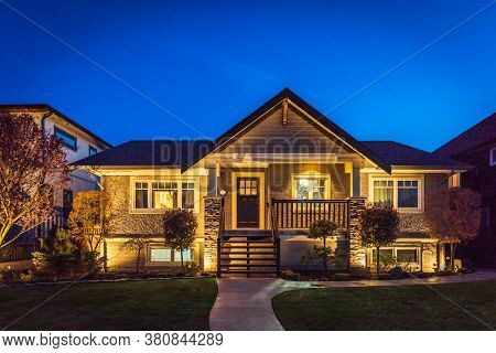 Luxury house at night with fantastic glow lights in Vancouver, Canada.