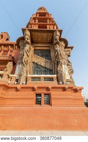 Low Angle Of The Tower Of Baron Empain Palace, A Historic Mansion Inspired By The Cambodian Hindu Te