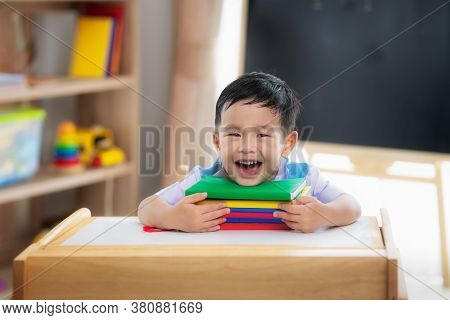 Asian Student Happy After Back To School And Smile In His Class Room In Preschool, This Image Can Us