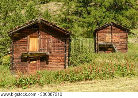 Two Rural Chalet On The Country Over Zermatt In The Swiss Alps