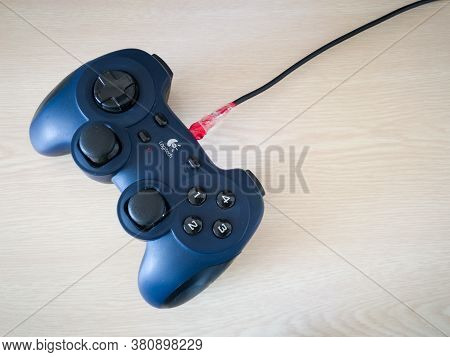Bosnia And Herzegovina - April 10, 2020: Used Dusty Computer Hardware With Fixed Cable, Joystick For