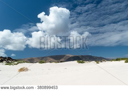 Landscape With White Sand, Volcano And Blue Sky In Caleton Blanco, Lanzarote, Spain
