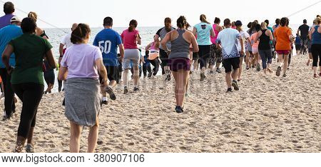 Babylon, New York, Usa - 24 June 2019: Hundreds Of Runners Are Running A Race On The Beach As Part O