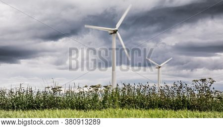 Wind Turbines On A Cloudy Autumn Day.