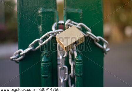 Golden Key Lock Chain Lock With Green Iron Door
