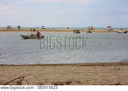 The Clean Sea With The Sandy Summer Beach Of Pisa In Tuscany