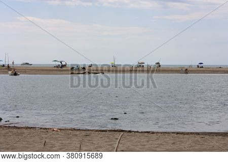 The Clean Sea With The Sandy Summer Beach Of Pisa In Tuscany