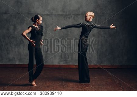 Young Couple Dancing In Ballroom Dance Paso Doble