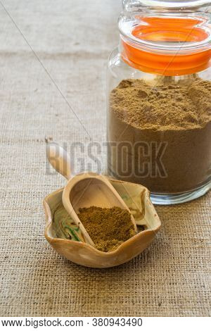 Ajwain Powder In Bowl On Textile Background