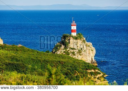 The Most Beautiful Lighthouse In Vladivostok Is The Basargin Lighthouse. Marine Lighthouse In Vladiv