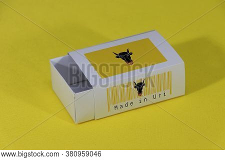 Uri Flag On White Box With Barcode And The Canton Color Flag Of Switzerland On Black Background, Pap