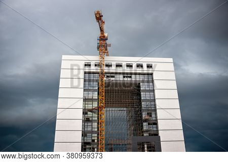 Crane on the site at the construction of a skyscraper