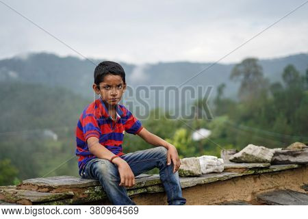 Portrait Of A Indian Pahadi Kid Who Belongs To The Mountains.