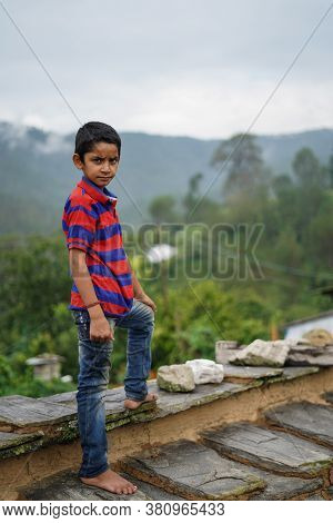 Portrait Of A Indian Pahadi Kid Who Belongs To The Mountains.