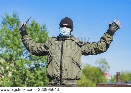 A Protester With A Knife Surrenders To Authorities During Protests