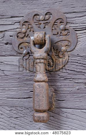 Rusty french antique door knocker