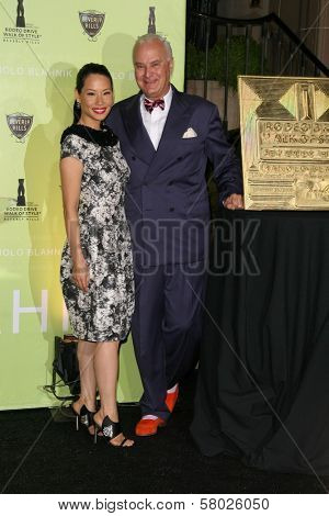 Lucy Liu and Manolo Blahnik  at the Rodeo Drive Walk of Style Award Gala. Rodeo Drive, Beverly Hills, CA. 09-25-08