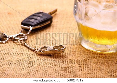 Car Key With Accident And Beer Mug