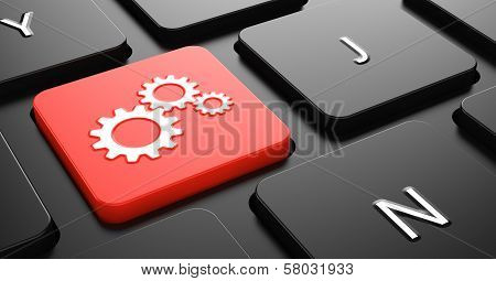 Cogwheel Gear Icon on Red Keyboard Button.