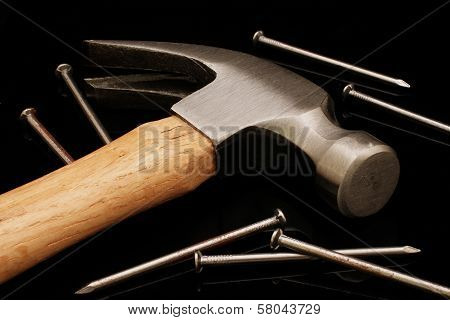 Hammer And Nails On Black