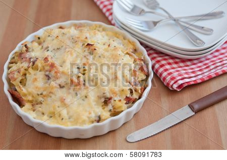 Creamy baked pasta with bacon and cheese