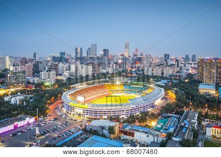 Beijing, China skyline and stadium.