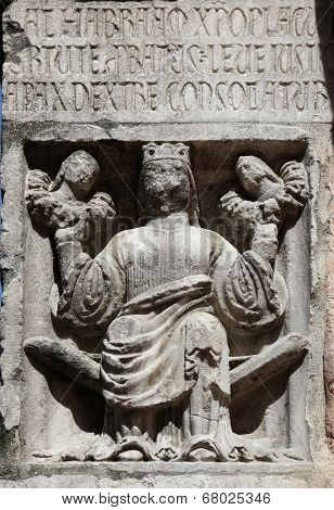 PARMA,ITALY-MAY 01, 2014:Faith(holding Justice and Peace)relief at the baptistery from Benedetto Antelami.Baptistery in Parma is considered to be among the most important Medieval monuments in Europe.