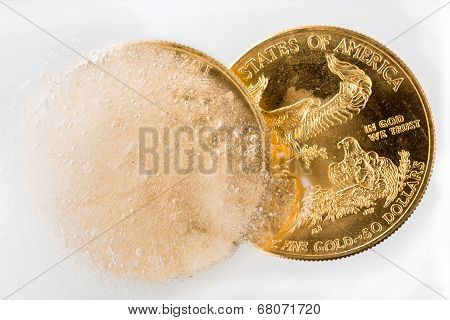 Golden Eagle Coin Emerging From Deep Freeze