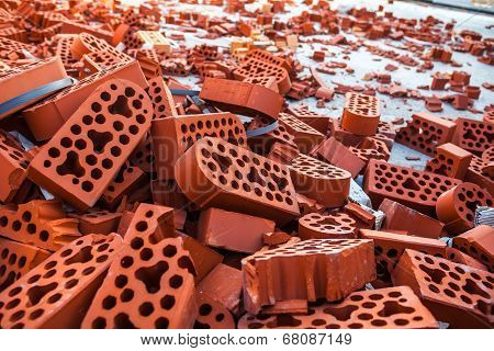 Pile Of New Intact And Beaten Bricks