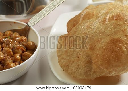 Indian Food: Chana masala with deep fried puri.