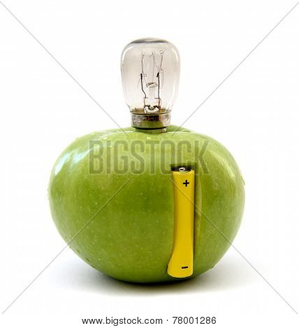 Green Apple With A Lamp And A Battery